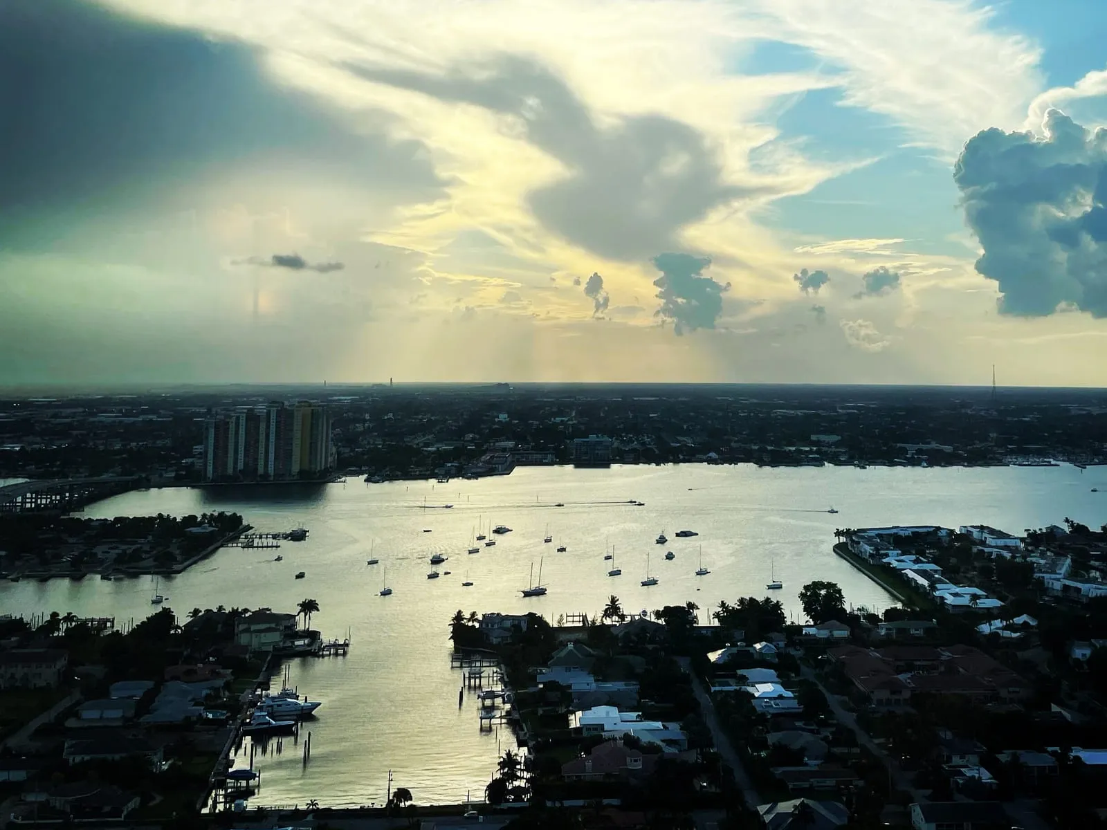 View west from a high floor at Tiara over Riviera Beach, its canals and the Lake Worth Lagoon